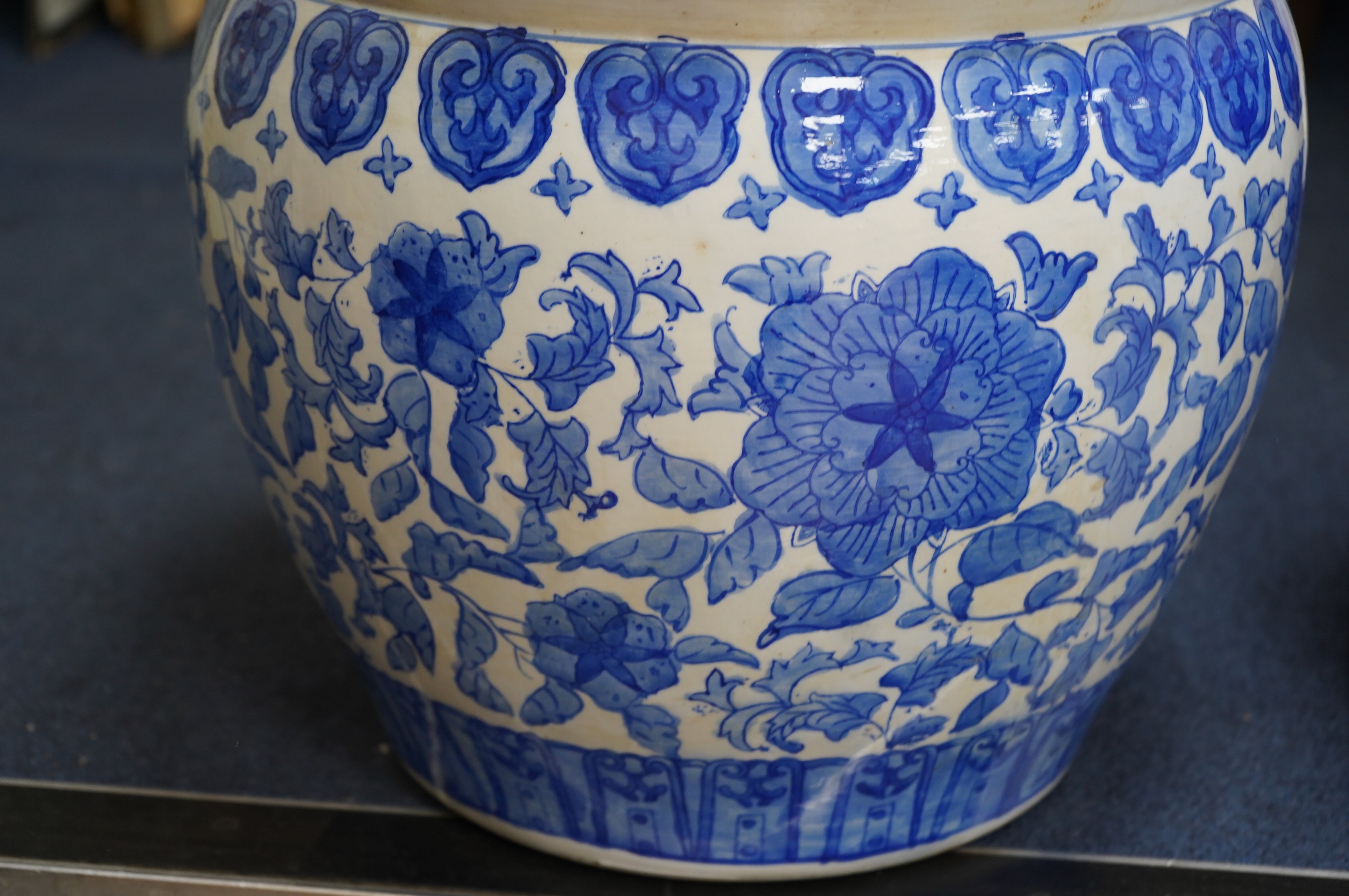 Two Chinese blue and white jardinieres, 31cm high. Condition - fair